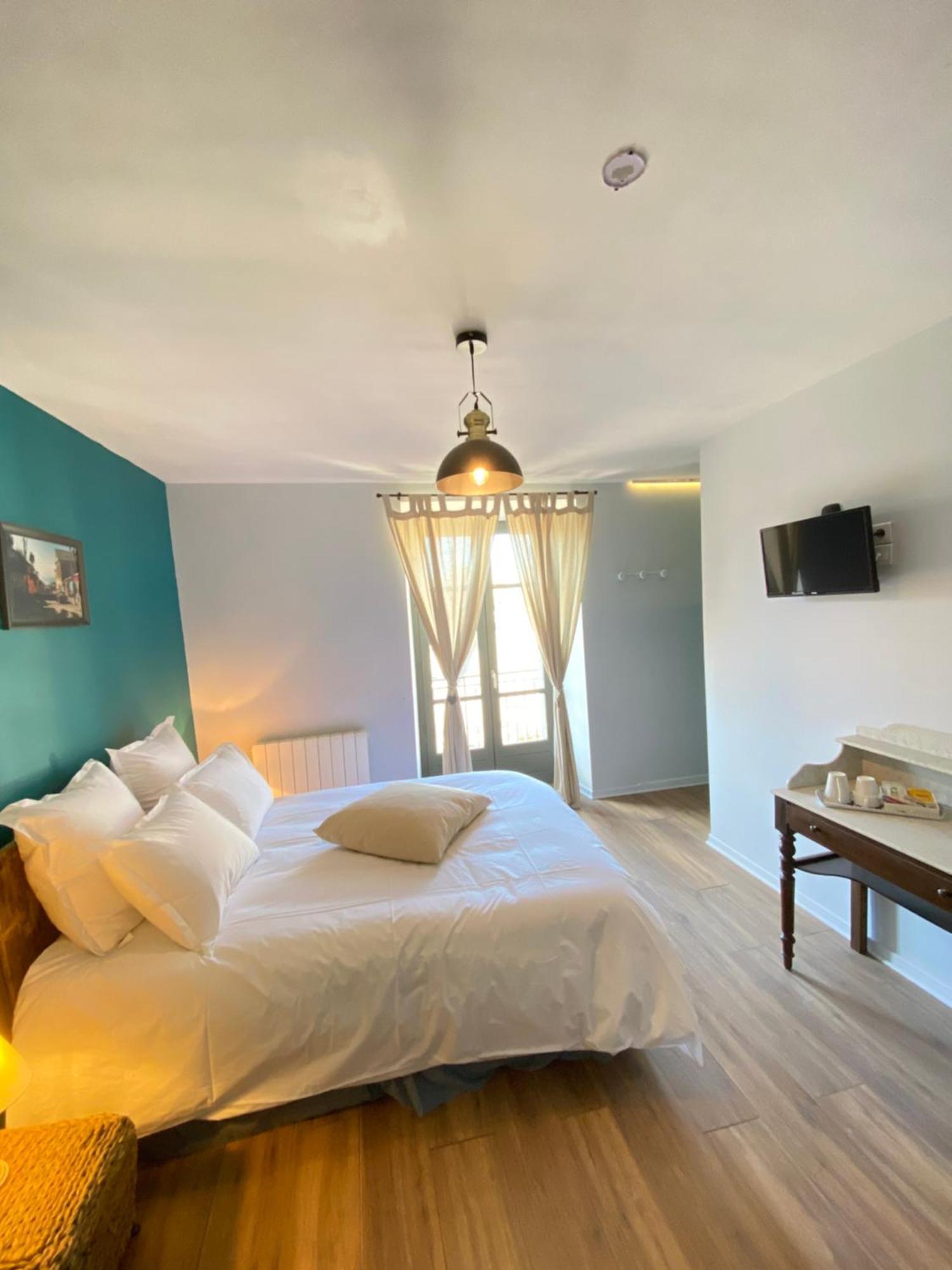 Au Pont D'Olt Hotel Saint-Come-d'Olt Ruang foto